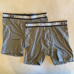 2 pairs of UA boxer briefs size Medium